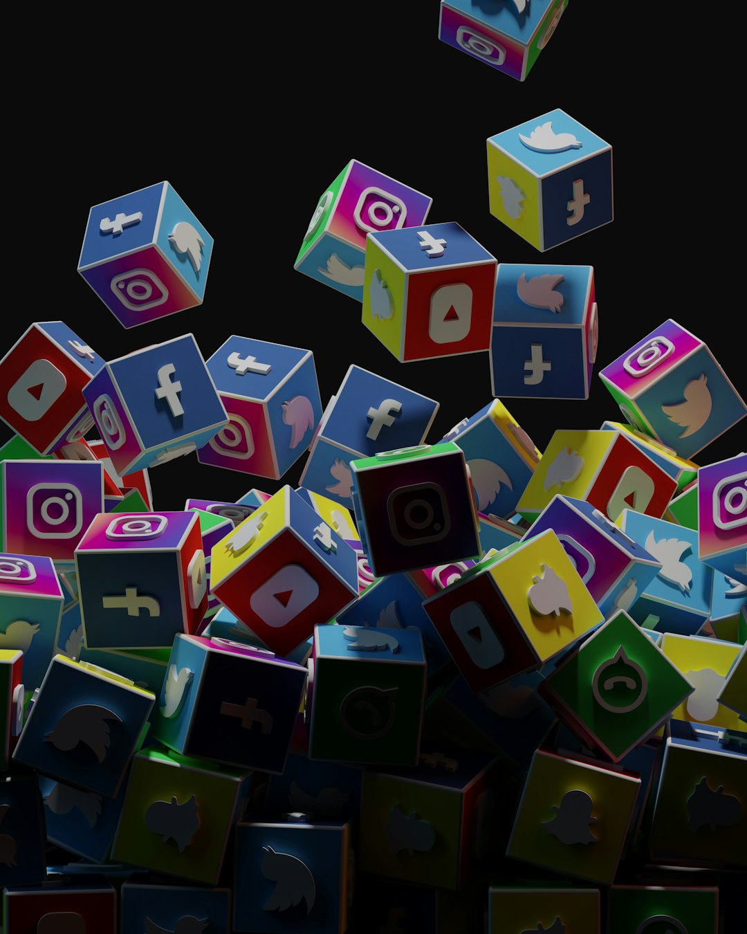 about-01 a-pile-of-colorful-cubes-with-social-icons-flying-out-of-them-nmz3sdzsyio